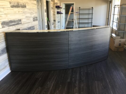 Curved Gray Reception Desk
