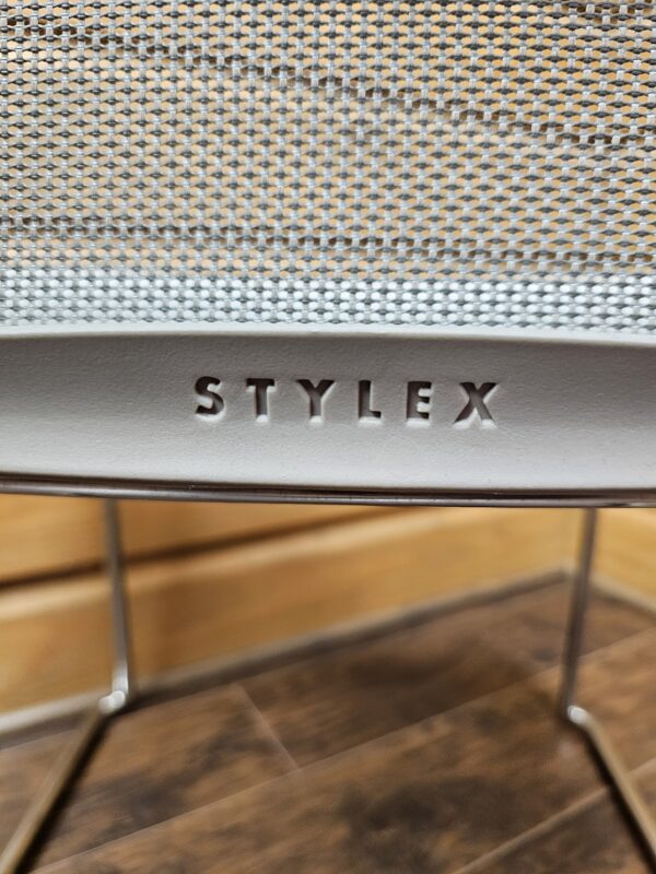 used stylex zephyr mesh stack chair branding